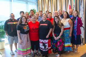 A group of people posing for a photoDescription automatically generated