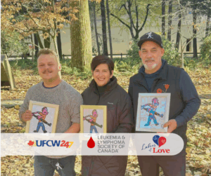 Caleb, Colleen, and Dan stand in a park holding framed images of the golfer logo